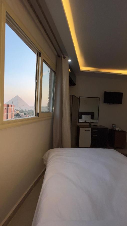 Pyramids Tower View Inn Nazlat as Sammān Exterior foto
